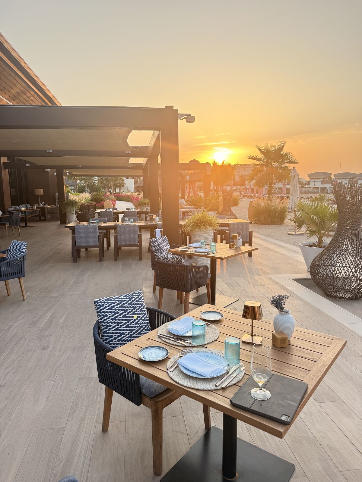 Anantara Beach Restaurant Dubai — signature dish and dining room