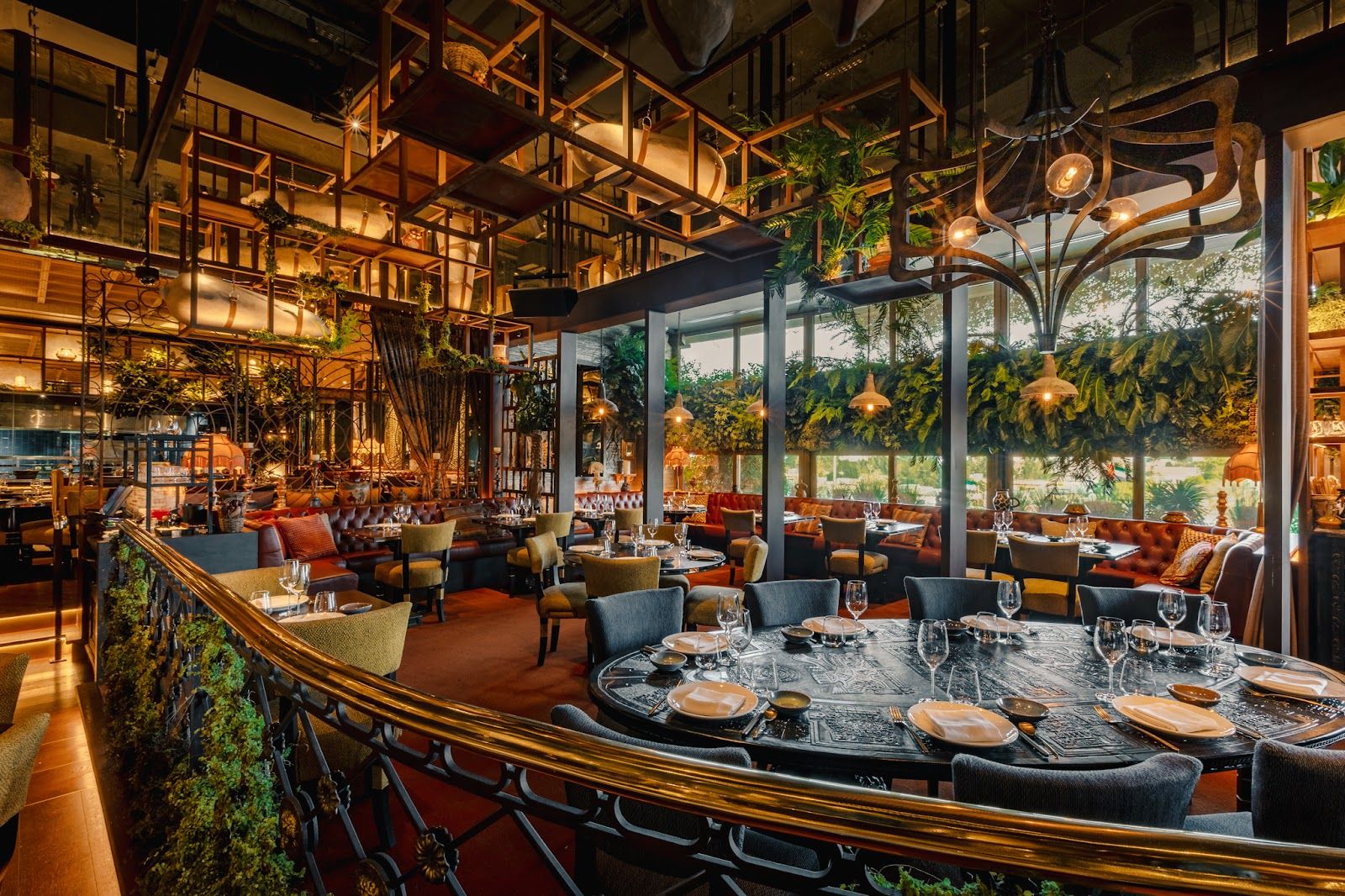 Coya Dubai DIFC interior — gold Peruvian décor and terrace overlooking Gate Village