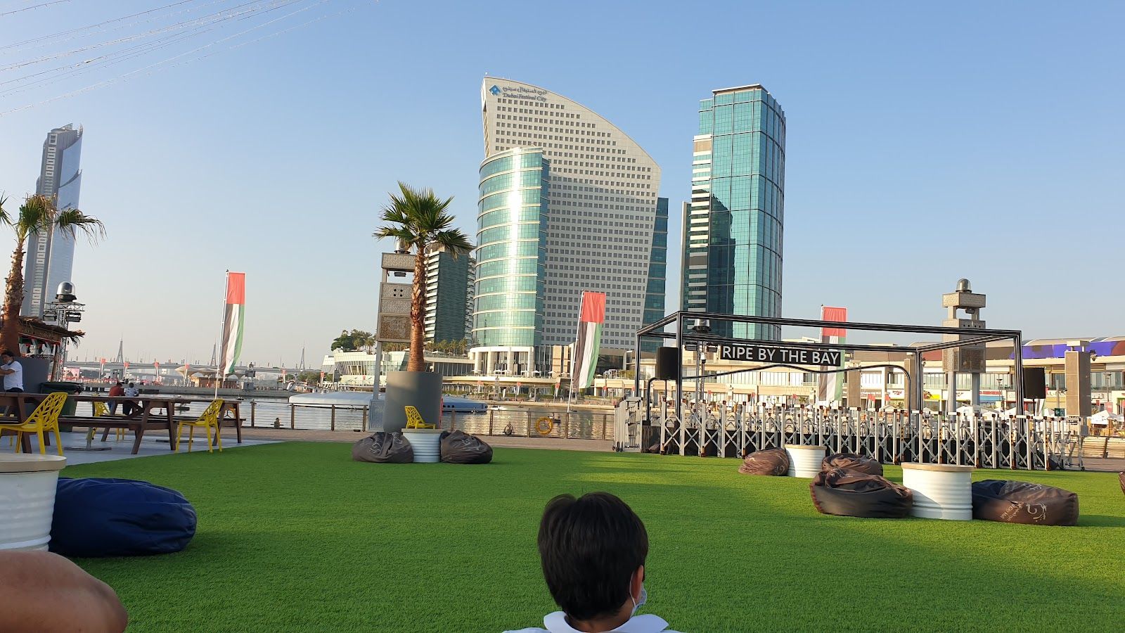 Festival Bay Dubai promenade view across creek to Downtown skyline