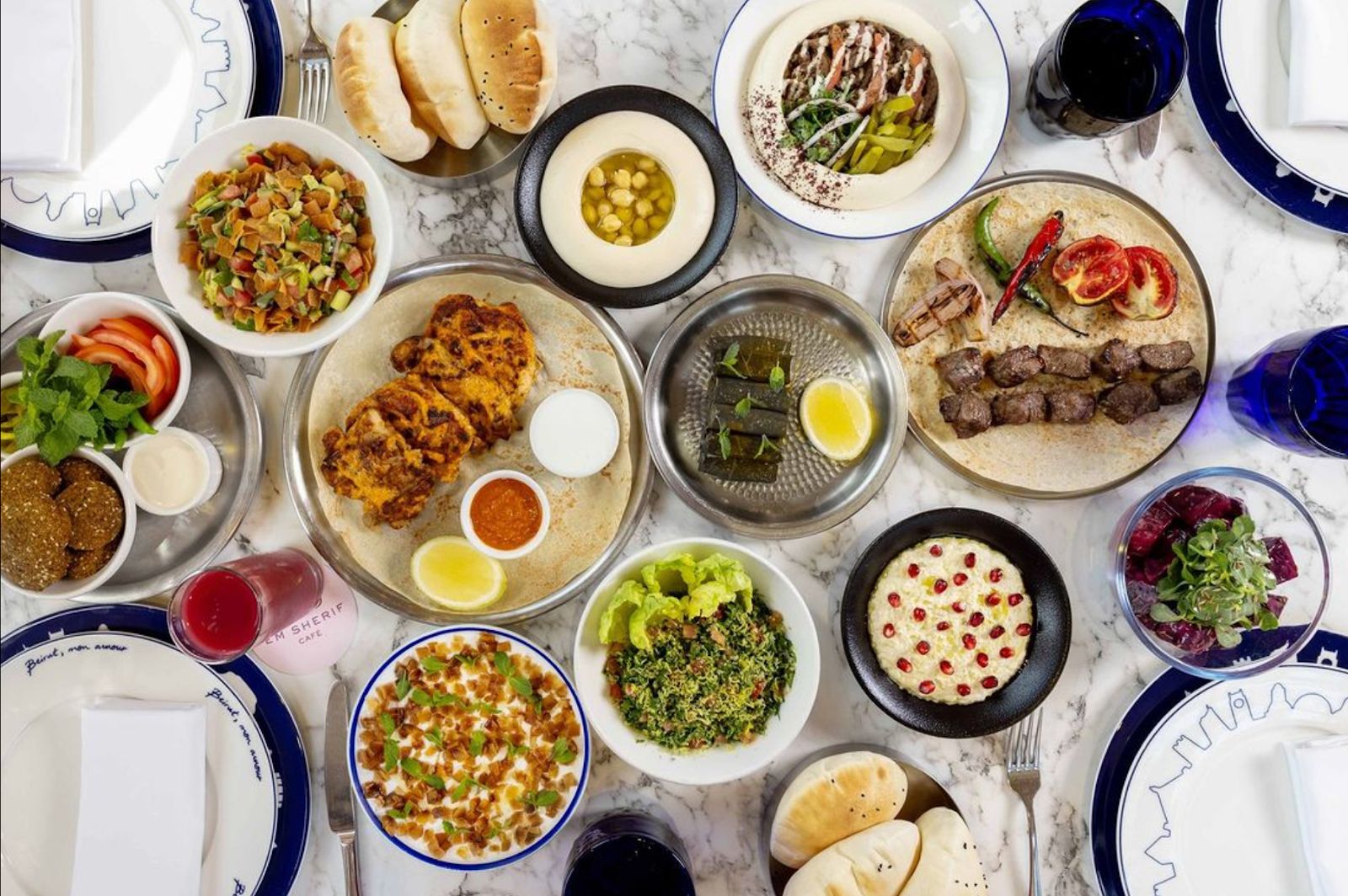Em Sherif Dubai — signature dish and dining room