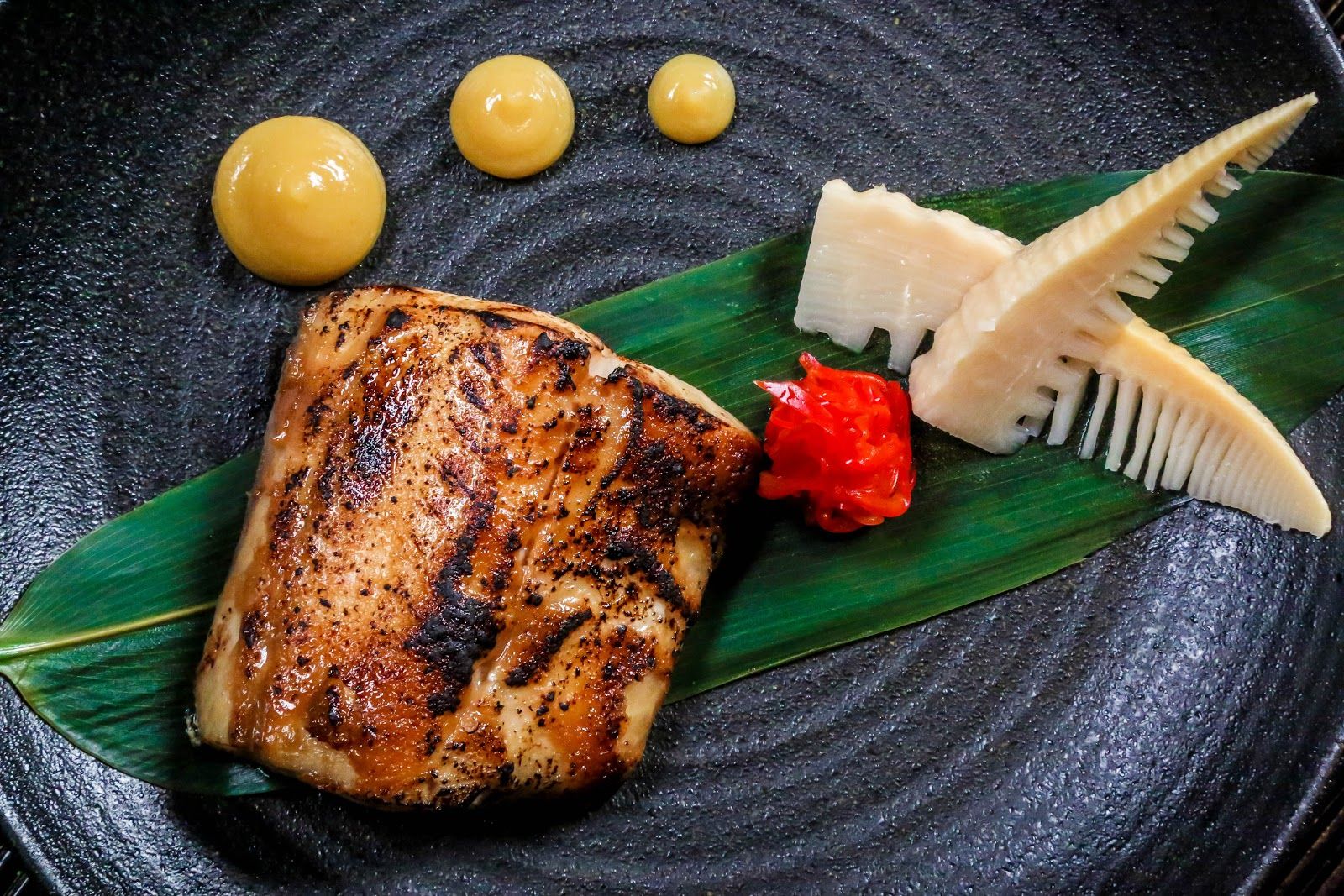 Karma Kafe Dubai — Souk Al Bahar terrace facing the fountain and tower