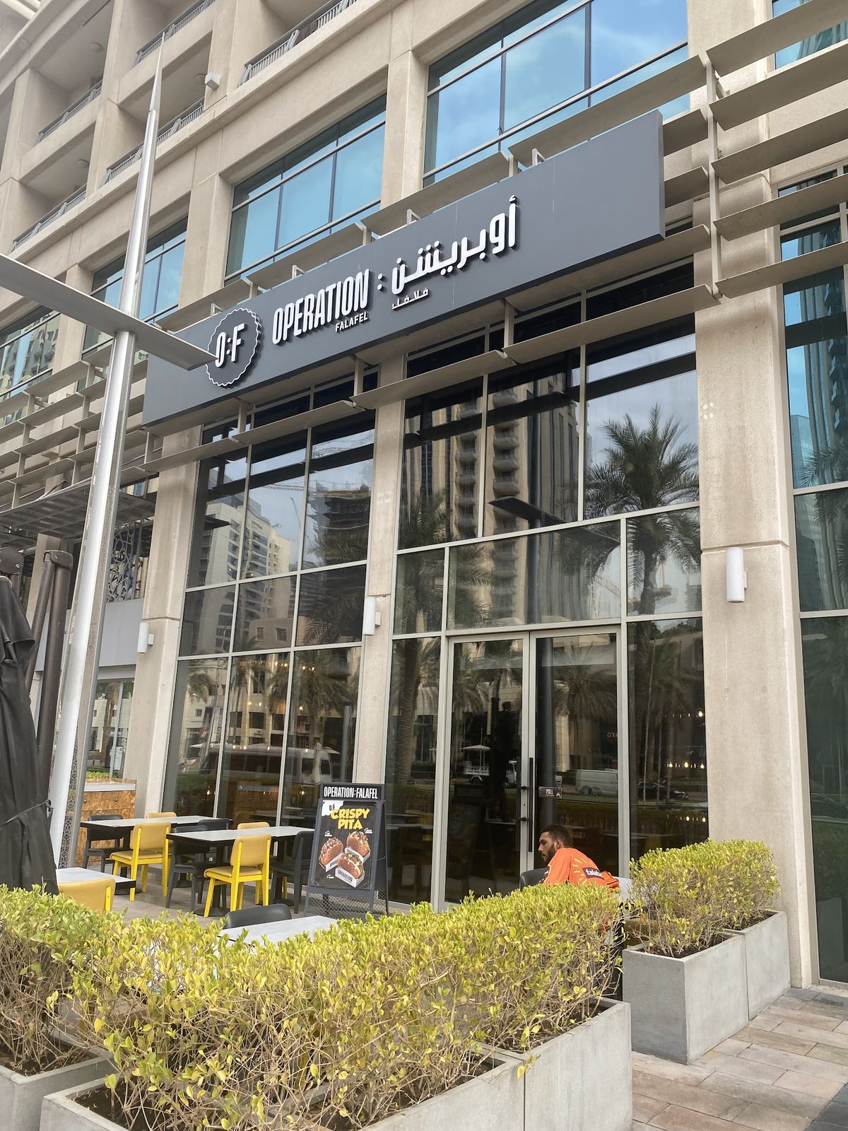 Operation: Falafel Dubai — loaded falafel wrap and street-food plates