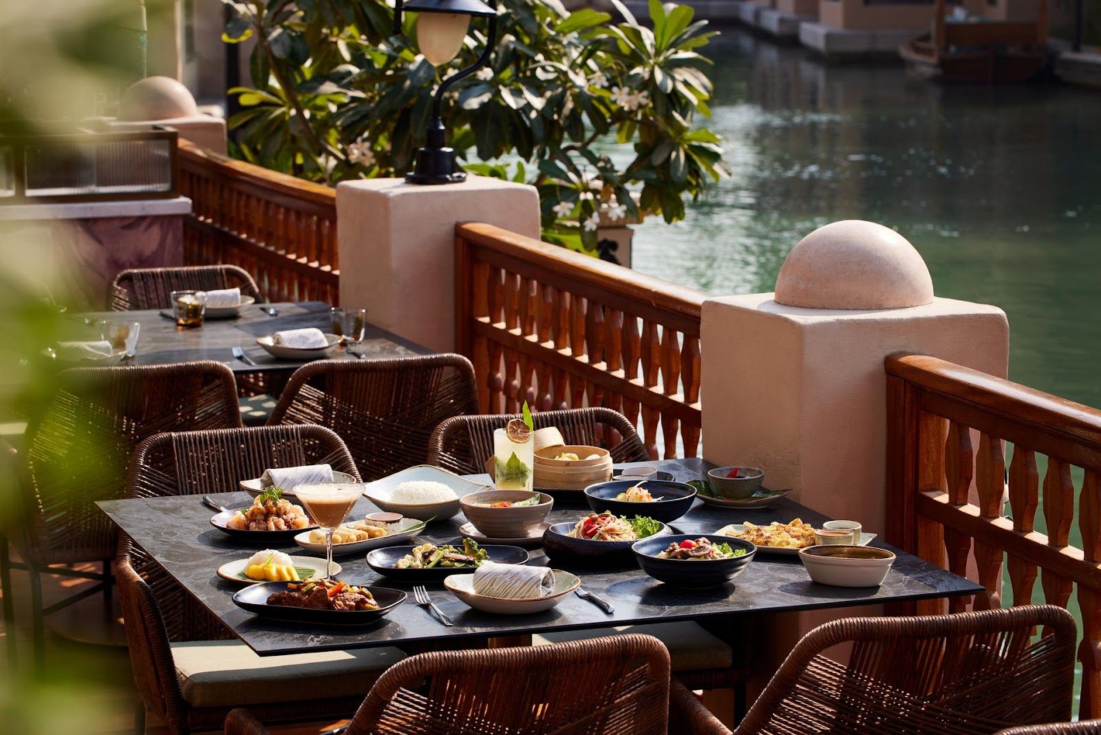 Pai Thai Dubai Madinat Jumeirah — waterway dining with abra arrival and candlelit tables